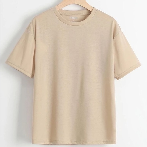 Beige and white tshirt (comes with the black shirt as well) - Picture 2 of 3